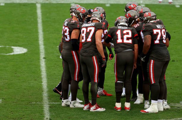 TAMPA, FLORIDA - JANUARY 03: Tom Brady #12 of the Tampa Bay Buccaneers calls a play during a game against the Atlanta Falcons at Raymond James Stadium on January 03, 2021 in Tampa, Florida. (Photo by Mike Ehrmann/Getty Images)