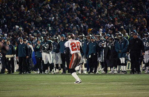 PHILADELPHIA, PA - JANUARY 19: The Philadelphia Eagles bench watch as Cornerback Ronde Barber #20 of the Tampa Bay Buccaneers runs for a touchdown after intercepting a pass by Quarterback Donovan McNabb #5 of the Philadelphia Eagles during the fourth quarter of the NFC Championship game at Veterans Stadium on January 19, 2003 in Philadelphia, Pennsylvania. The Buccaneers defeated the Eagles 27-10. (Photo by Doug Pensinger/Getty Images)