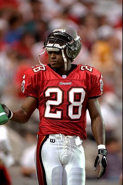 21 Sep 1997: Running back Warrick Dunn #28 of the Tampa Bay Buccaneers before the start of the Buccaneers 31-21 win over the Miami Dolphins at Houlihan''s Stadium in Tampa, Florida. Mandatory Credit: Scott Halleran /Allsport
